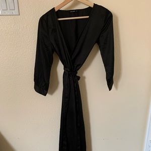 Midi silky black wrap dress.